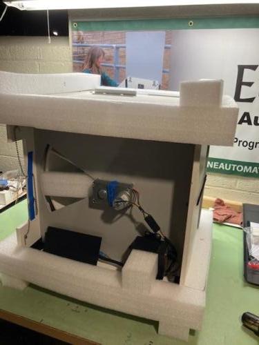Custom packaging material to securely brace and cushion the unit during shipping 
